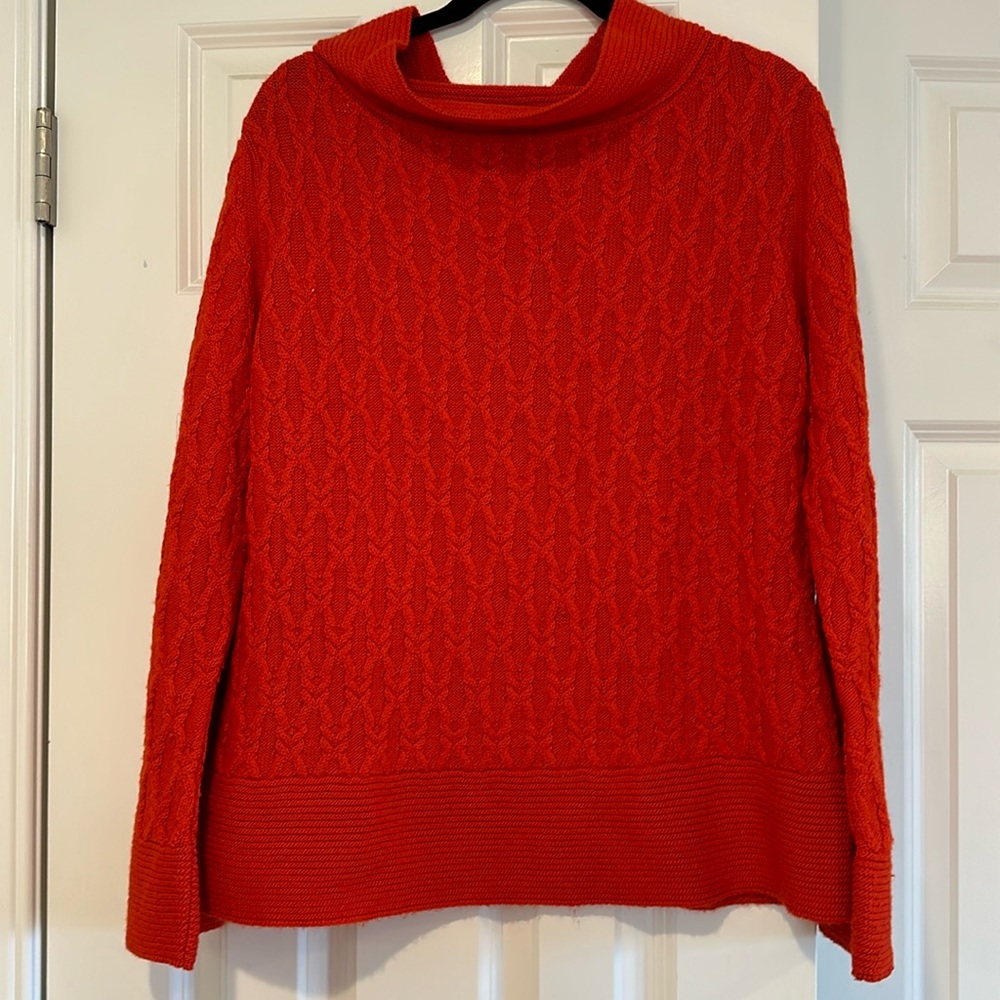 Women’s baby alpaca sweater.  XL fits like a large.  Made in Peru.